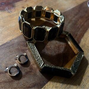 2 bracelets & small hoops! All in the sleek colors of black and gold